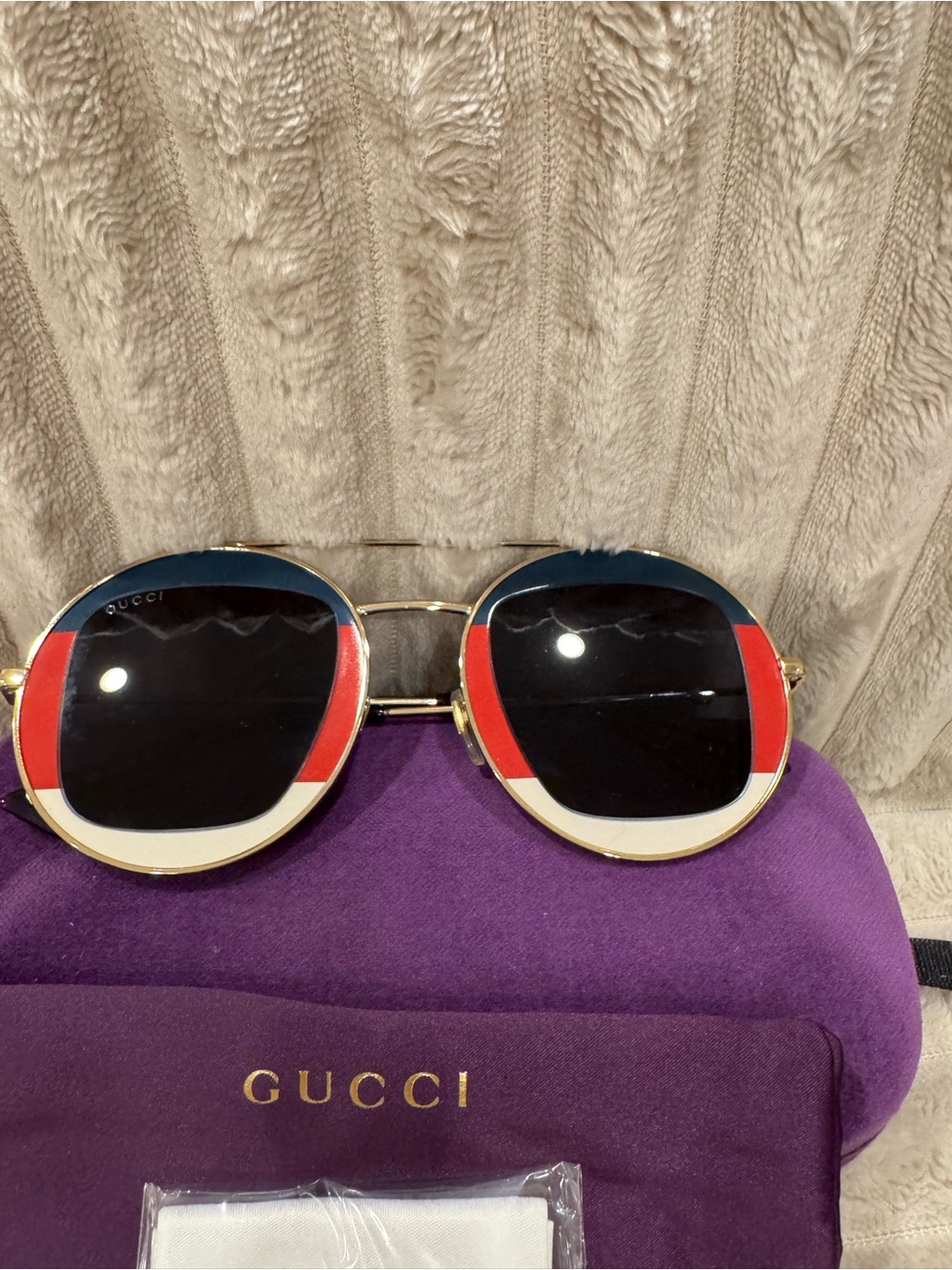 Gucci Round Sunglasses with Gold Frame and Blue, Red, Cream Accents